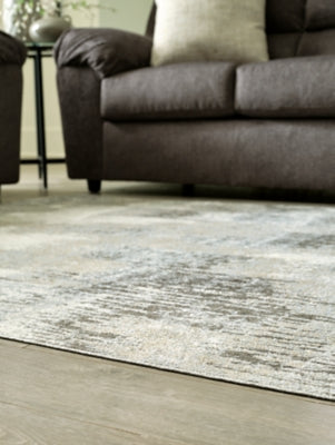 Ashley Arriston Multi 5'3" x 7' Washable Rug