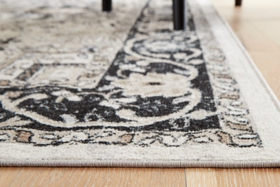 Ashley Gregmoore Multi 5'2" x 6'10" Washable Rug