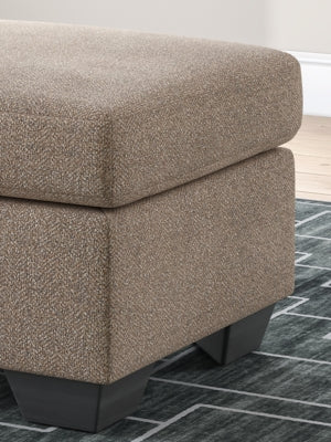 Benchcraft Triston-Peaks Suede Ottoman