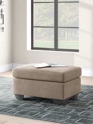 Benchcraft Triston-Peaks Suede Ottoman
