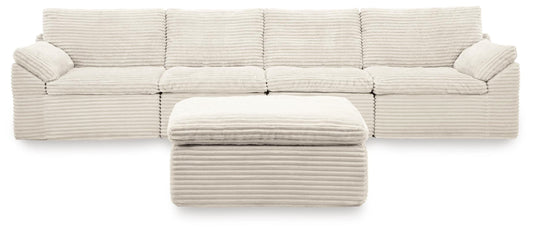 Ashley Canefield Ivory 4-Piece Sectional with Ottoman