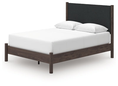 Ashley Cadmori Brown Queen Upholstered Panel Platform Bed