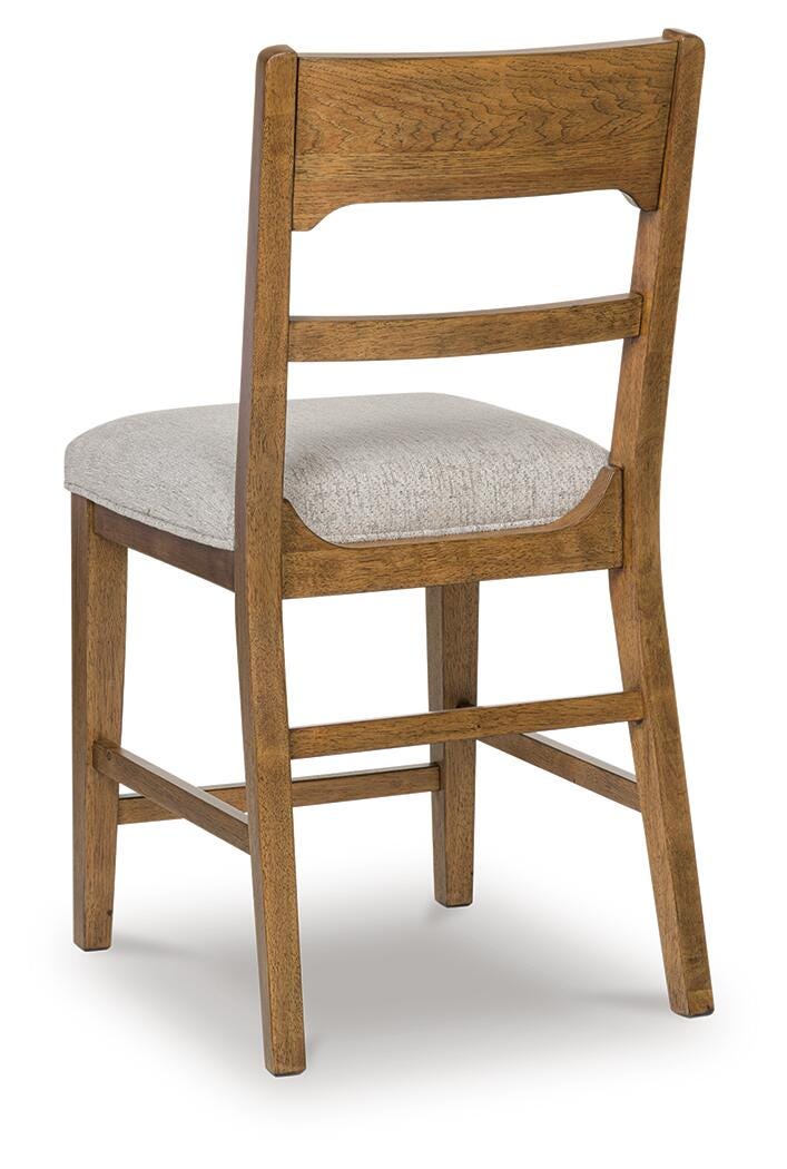 Ashley Cabalynn Oatmeal Light Brown Counter Height Barstool (Set of 2)