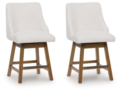 Ashley Cabalynn Oatmeal Light Brown Counter Height Barstool (Set of 2)