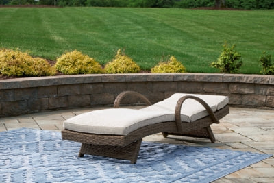 Ashley Beachcroft Beige Outdoor Chaise Lounge with Cushion