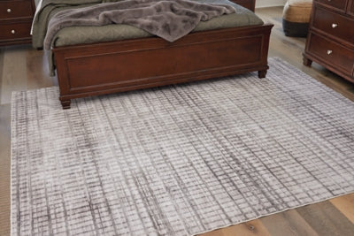 Ashley Moorhill Cream Taupe 7'7" x 9'8" Washable Rug