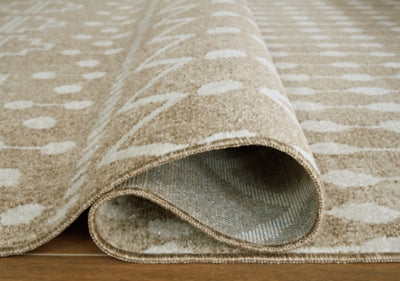 Ashley Bunchly Tan Brown Cream 4'11" x 7'2" Washable Rug