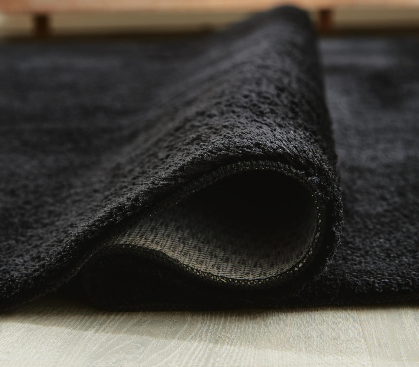 Ashley Anaben Black 5' x 7' Washable Rug