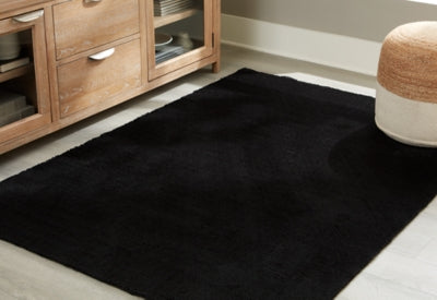 Ashley Anaben Black 5' x 7' Washable Rug