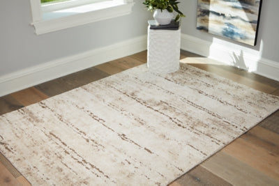 Ashley Kasney Cream Brown 5' x 7' Rug