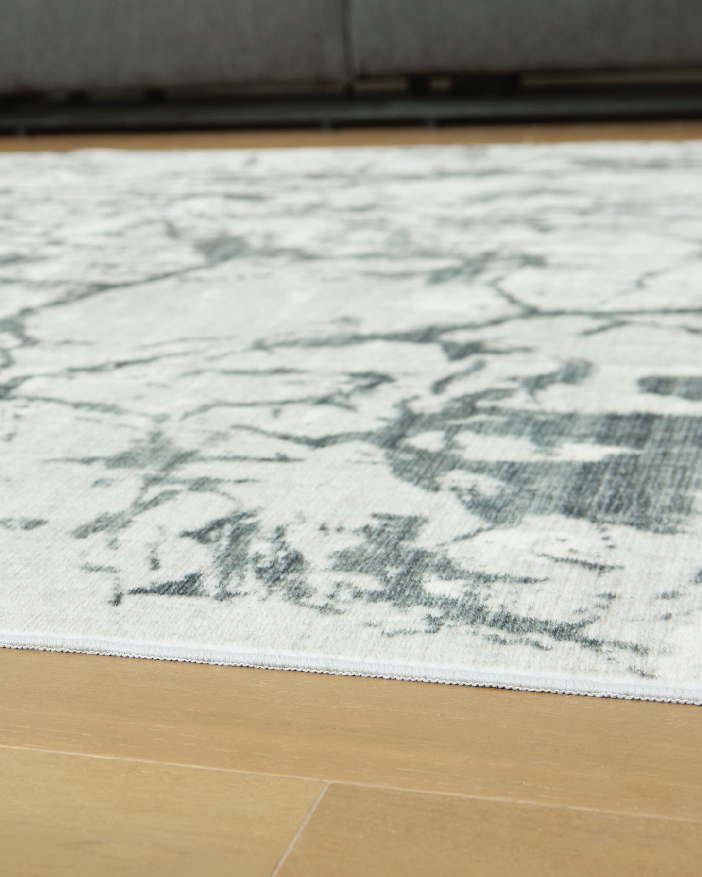 Ashley Tobinbury Gray Washable 5' x 7' Area Rug