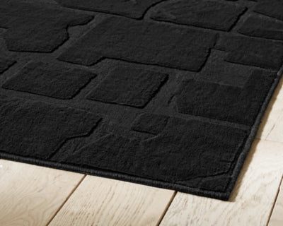 Ashley Gibbswell Black Washable 5' x 7' Area Rug