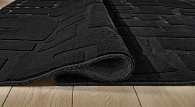 Ashley Gibbswell Black Washable 5' x 7' Area Rug