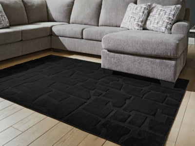 Ashley Gibbswell Black Washable 5' x 7' Area Rug