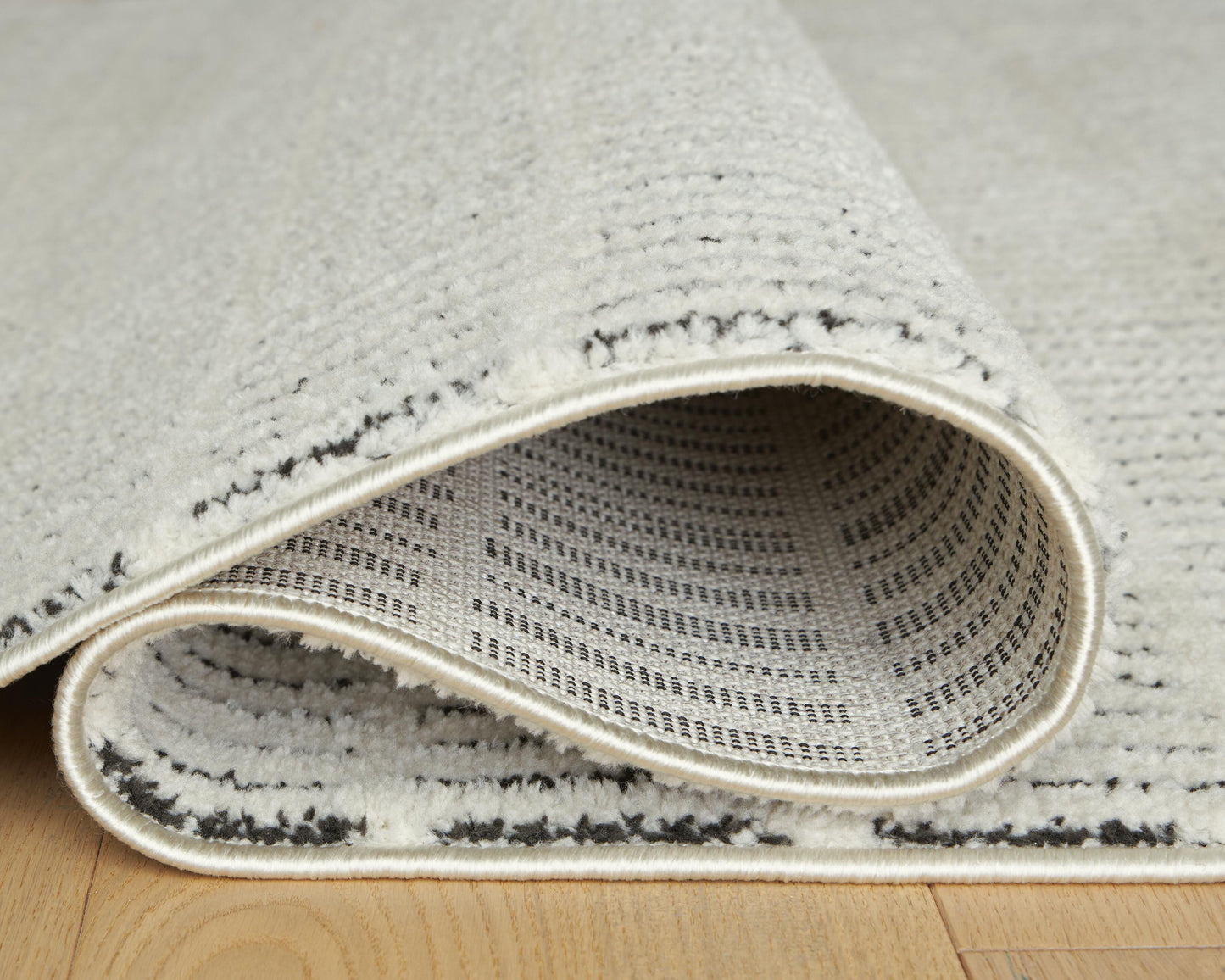Ashley Turinwith Ivory Black 5'3" x 7' Area Rug