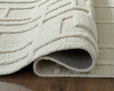 Ashley Empriss Ivory 5' x 7' Area Rug
