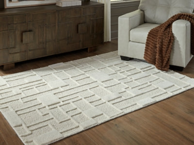 Ashley Empriss Ivory 5' x 7' Area Rug