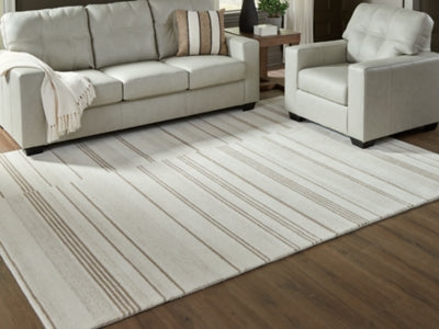 Ashley Gadence Ivory Tan 7'8" x 10' Area Rug
