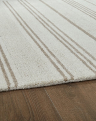 Ashley Gadence Ivory Tan 5' x 7' Area Rug