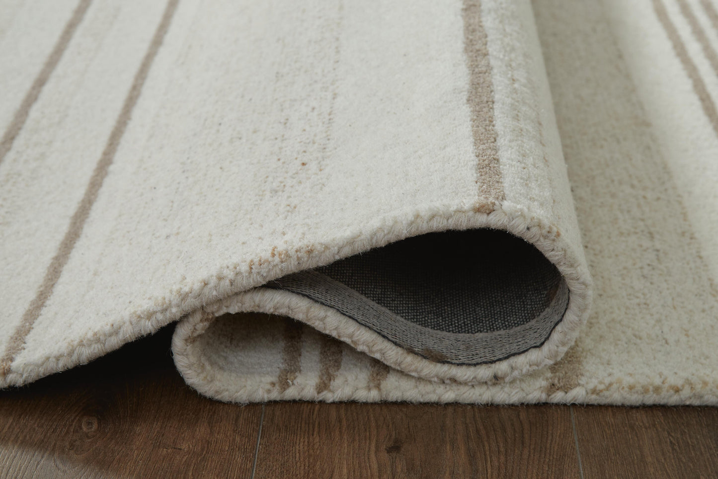 Ashley Gadence Ivory Tan 5' x 7' Area Rug