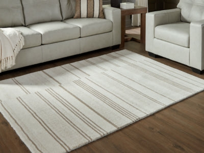 Ashley Gadence Ivory Tan 5' x 7' Area Rug