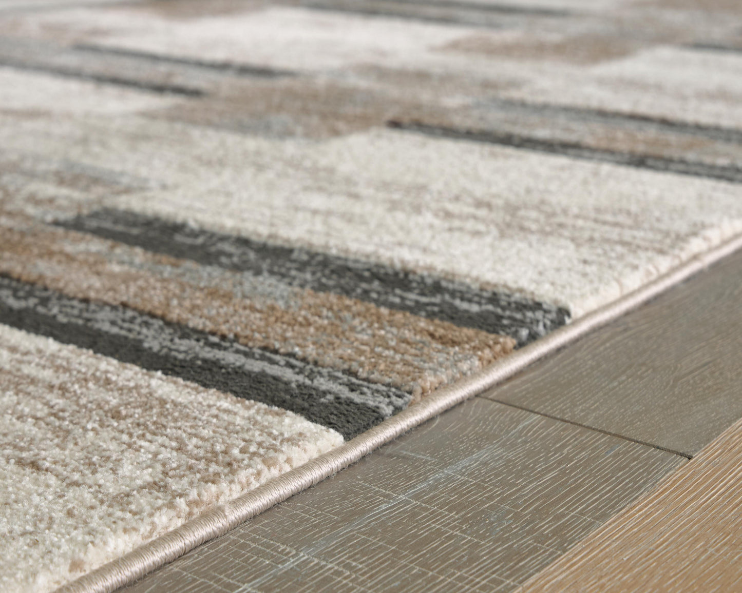 Ashley Alstone Multi 5'3" x 7' Area Rug