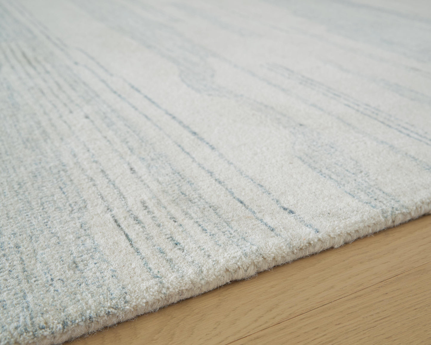 Ashley Genemost Ivory Blue 5' x 7' Area Rug