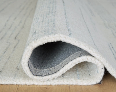 Ashley Genemost Ivory Blue 7'8" x 10' Area Rug